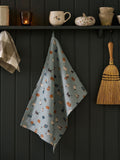 Torchon Sophie Allport, motif pattes et citrouilles bleu sarcelle.